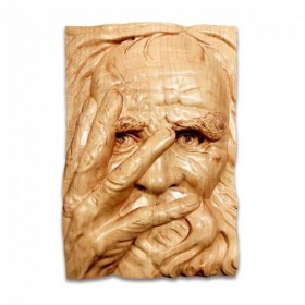 Wooden statue of an old man